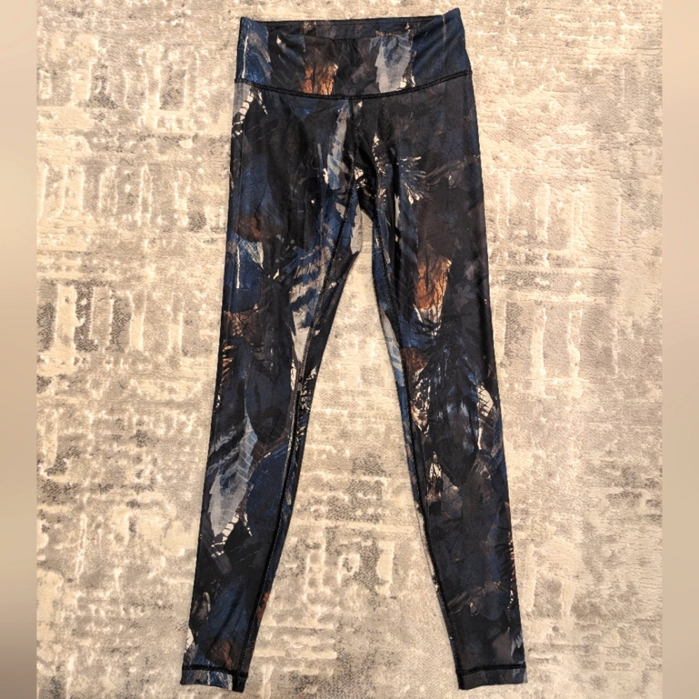 RARE lululemon wanderlust painted feathers tights